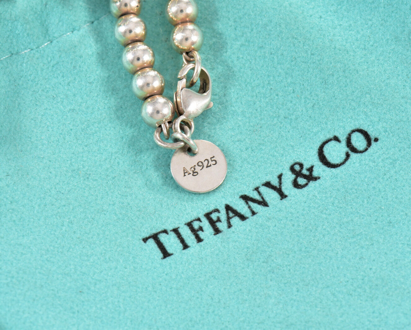 7.75" Please Return To Tiffany & Co Silver Blue Enamel Heart Charm Bead Bracelet