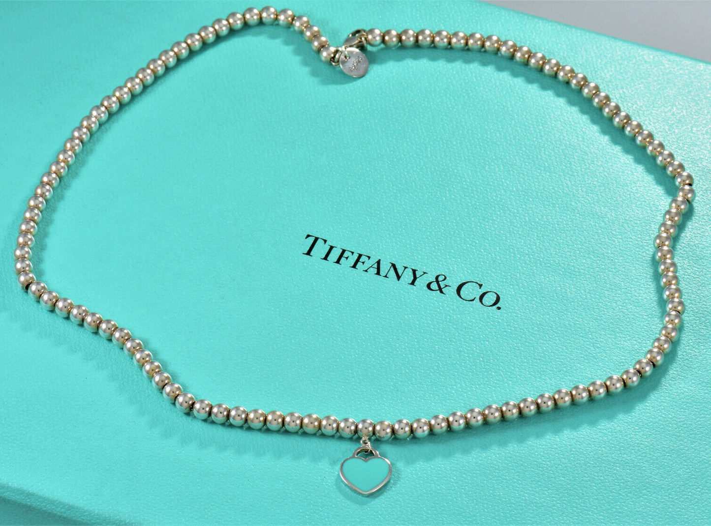 18" Please Return To Tiffany & Co Silver Blue Enamel Heart Pendant Bead Necklace