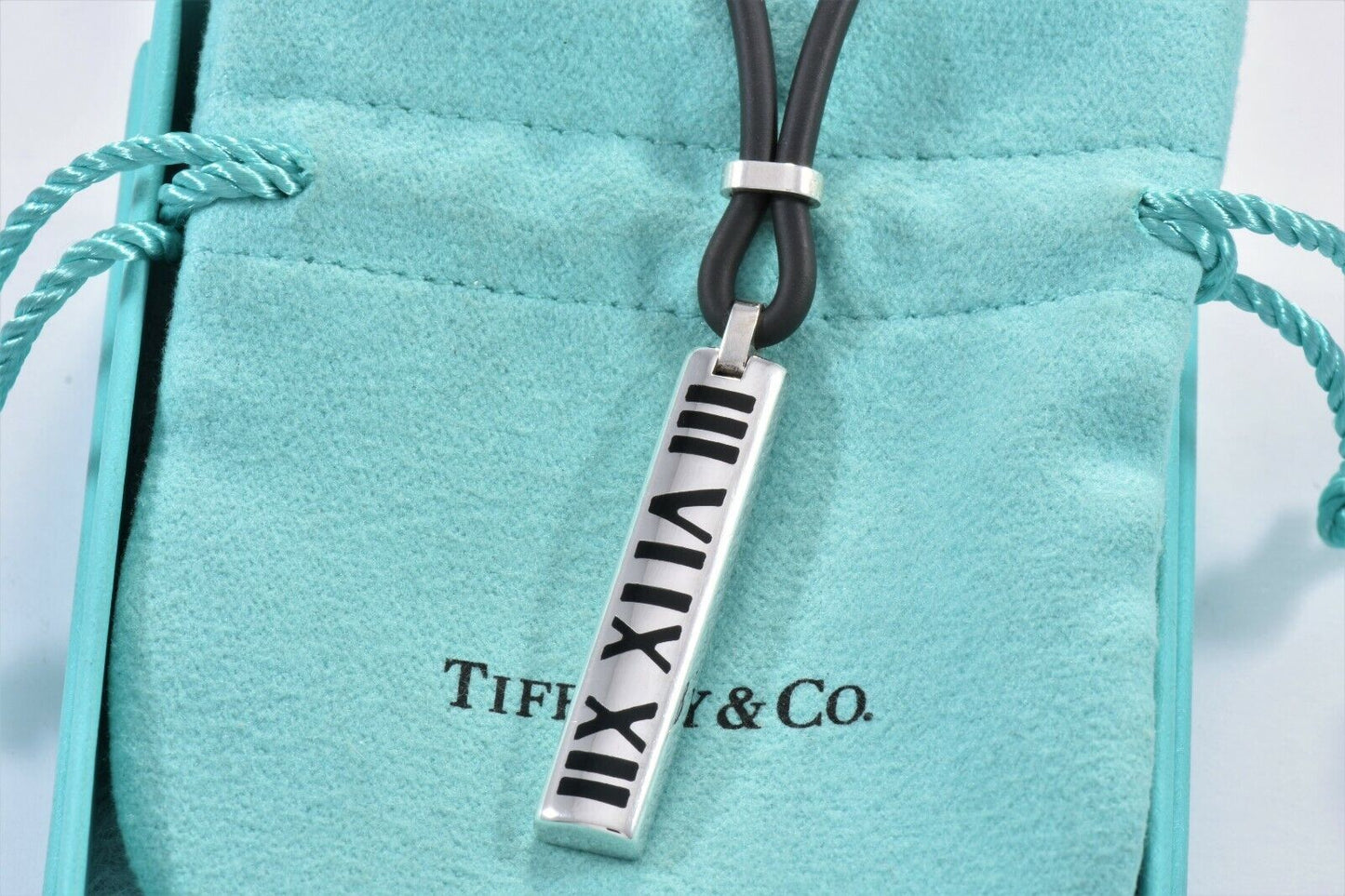 Tiffany & Co Silver Enamel Atlas Roman Numeral Pendant Rubber Surfer Necklace