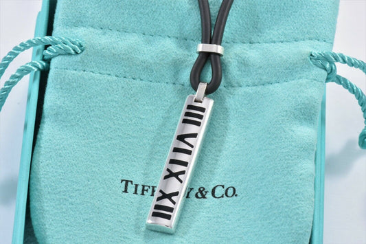 Tiffany & Co Silver Enamel Atlas Roman Numeral Pendant Rubber Surfer Necklace