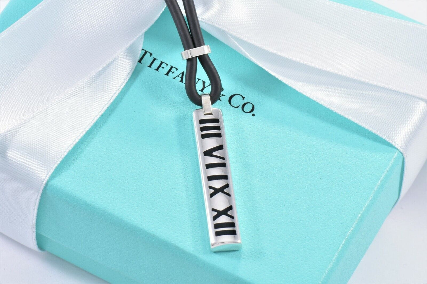 Tiffany & Co Silver Enamel Atlas Roman Numeral Pendant Rubber Surfer Necklace