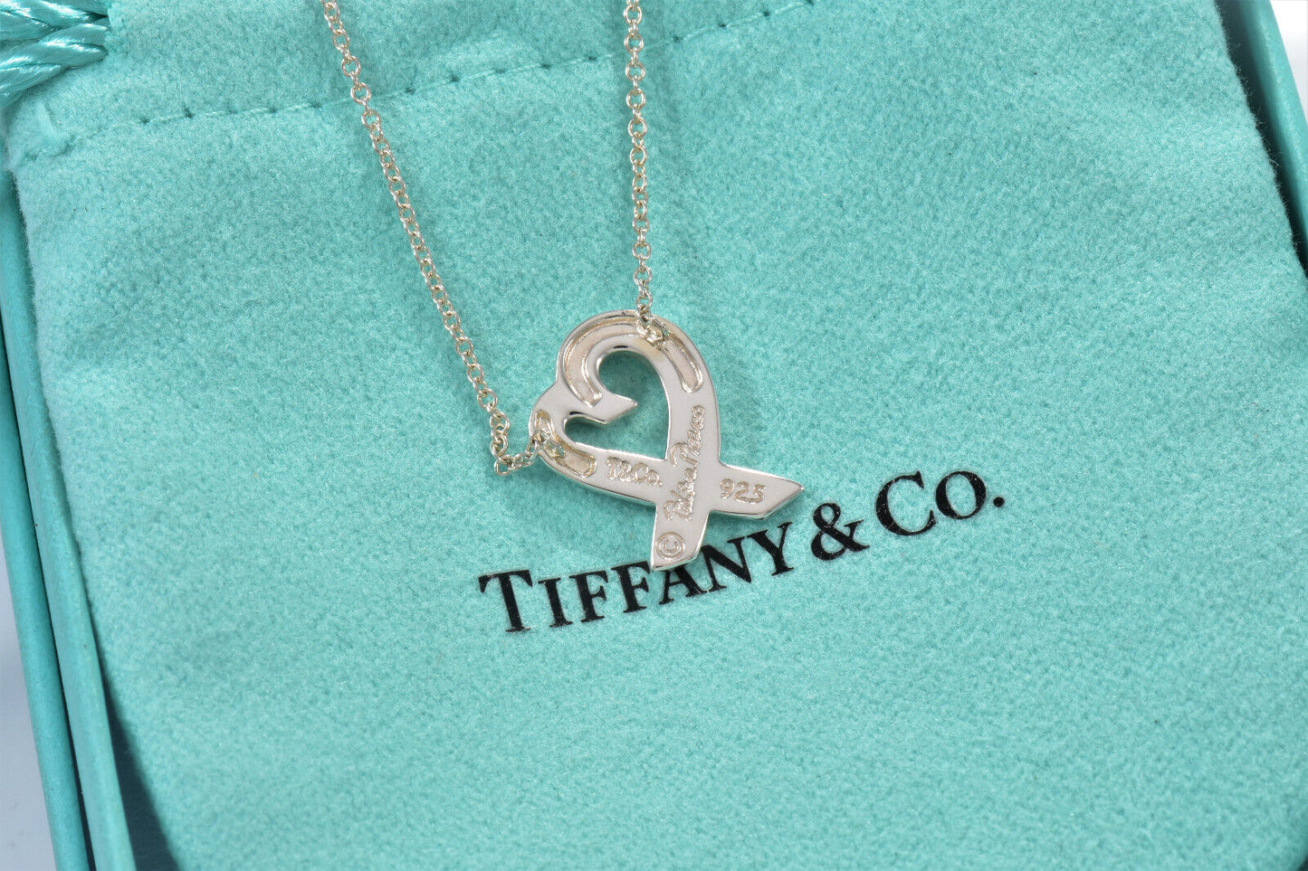 Tiffany & Co Silver Pink Sapphire Paloma Picasso Loving Heart Pendant Necklace