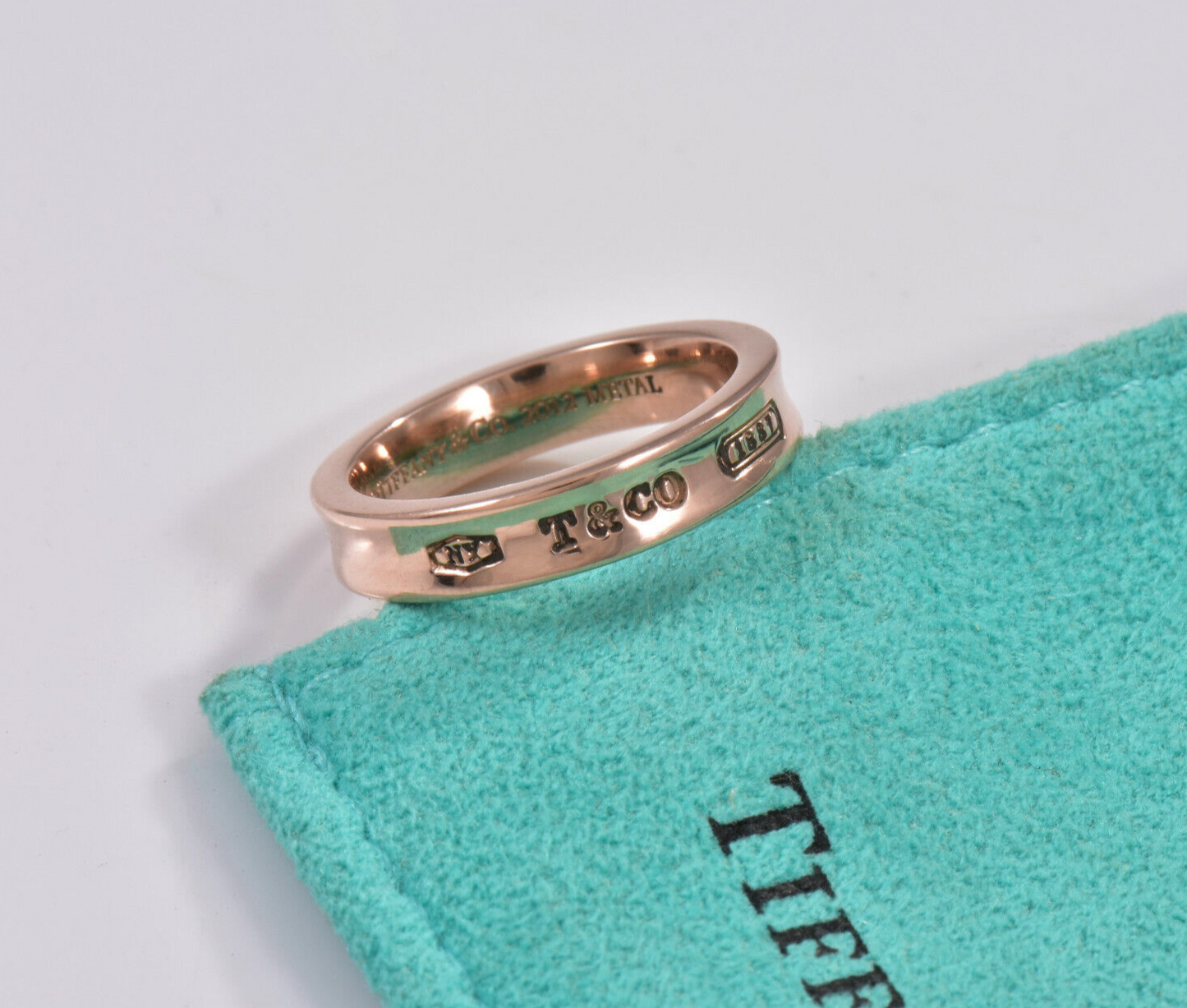 Size 6 Tiffany & Co Rubedo Gold Metal Narrow 1837 Band Ring and Pouch Lovely