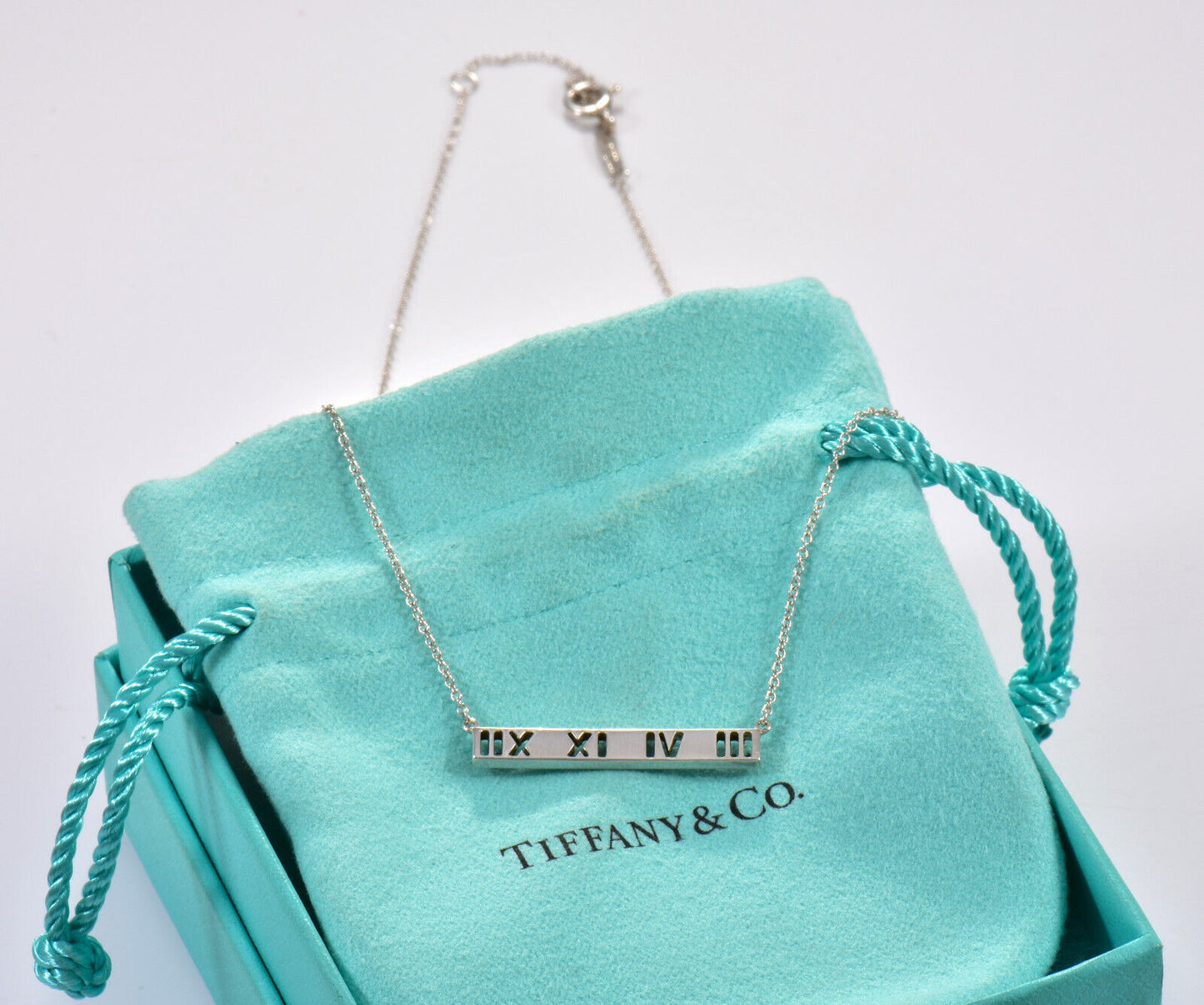 Tiffany & Co Silver Atlas Roman Numeral Bar Pendant Adjustable Necklace in Pouch