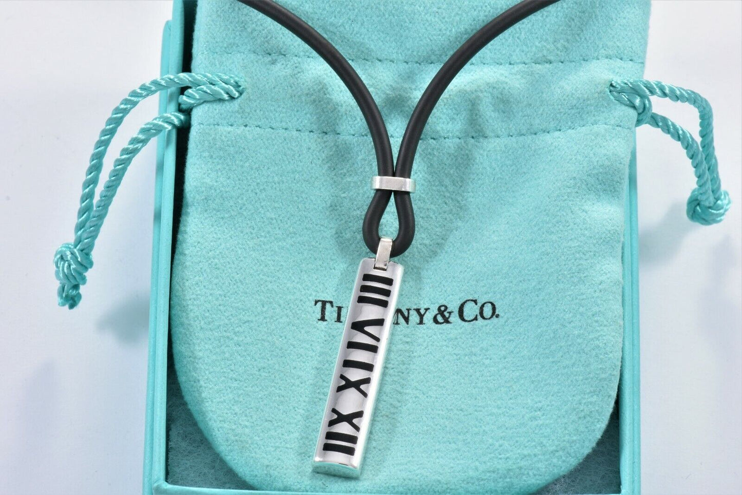 Tiffany & Co Silver Enamel Atlas Roman Numeral Pendant Rubber Surfer Necklace