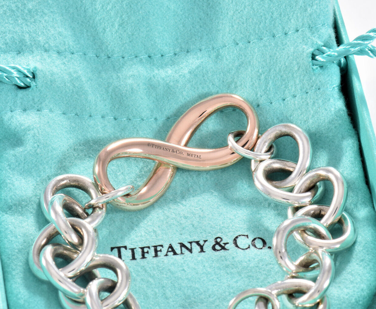 Heavy 7.75" Tiffany & Co Rubedo Gold Metal Silver Infinity Large Chain Bracelet