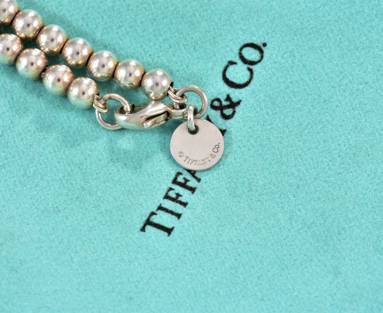 7.75" Please Return To Tiffany & Co Silver Blue Enamel Heart Charm Bead Bracelet