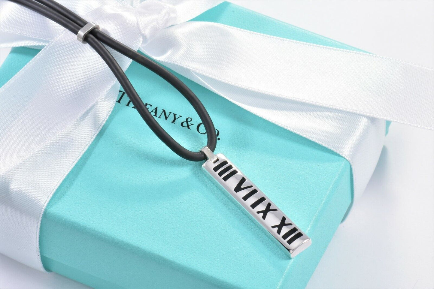 Tiffany & Co Silver Enamel Atlas Roman Numeral Pendant Rubber Surfer Necklace