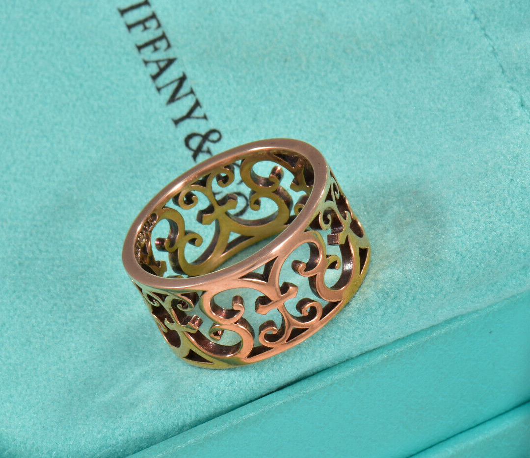 Size 4.5 Tiffany & Co Rubedo Gold Metal Enchant Scroll Wide Band Ring in Pouch