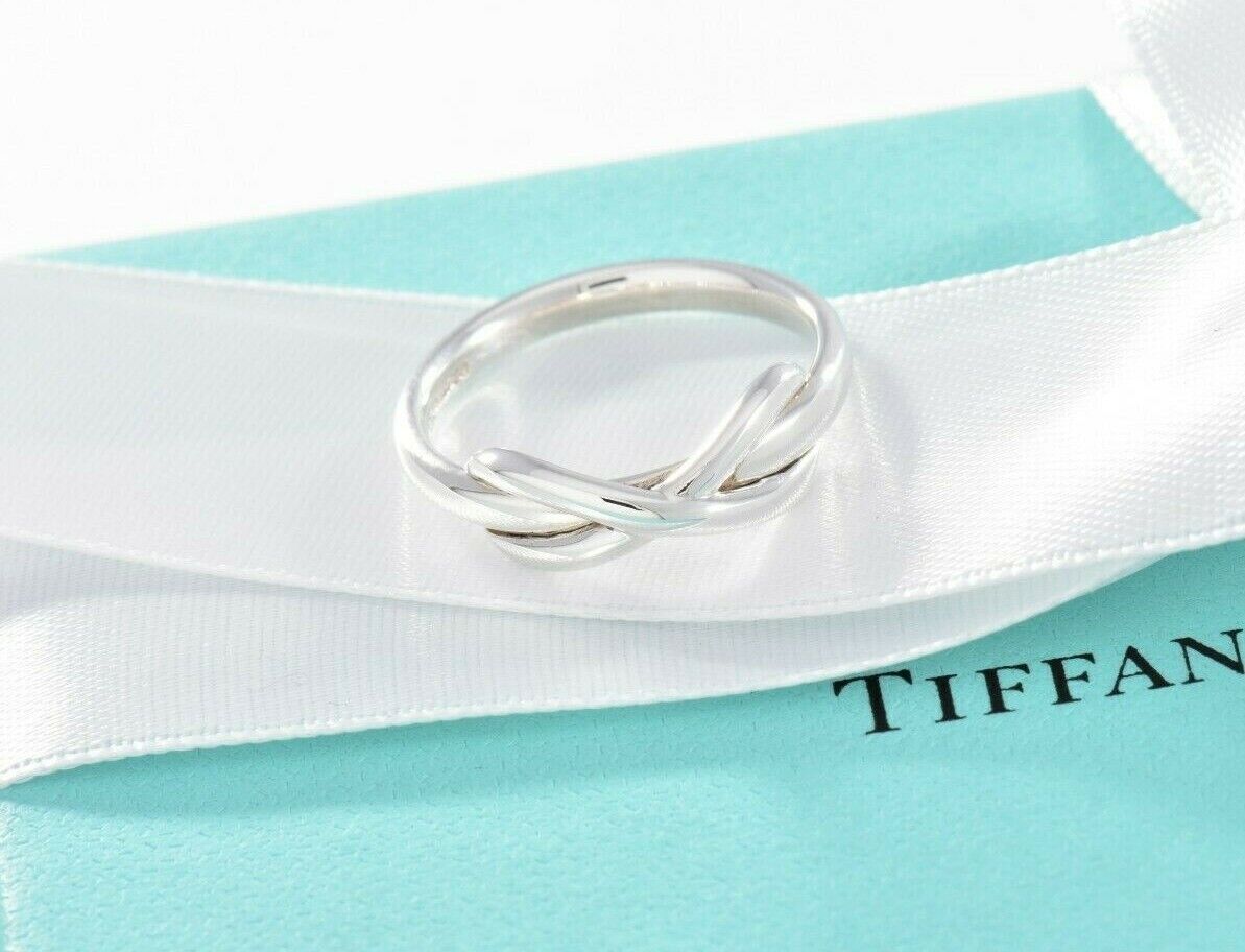 Tiffany & Co Sterling Silver Infinity Ring Size 5 in Box Pouch Narrow Knot Band