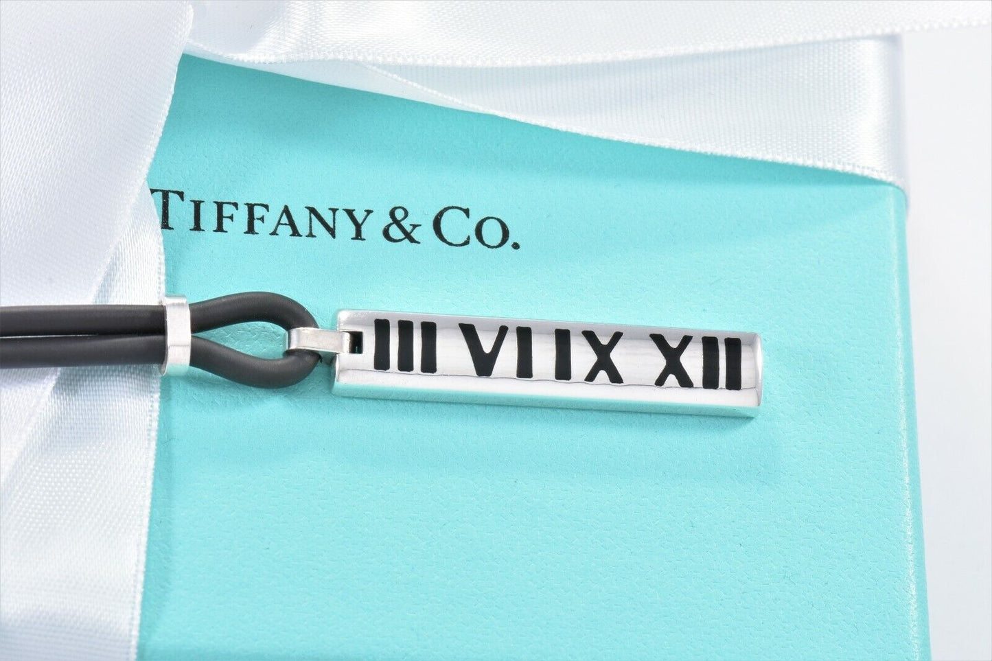 Tiffany & Co Silver Enamel Atlas Roman Numeral Pendant Rubber Surfer Necklace