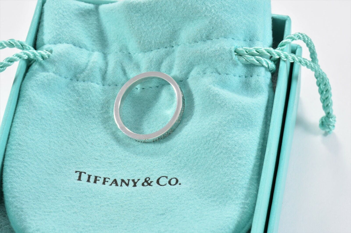 Tiffany & Co Silver Fifth Avenue Address Notes Narrow Band Ring Size 7 in Pouch