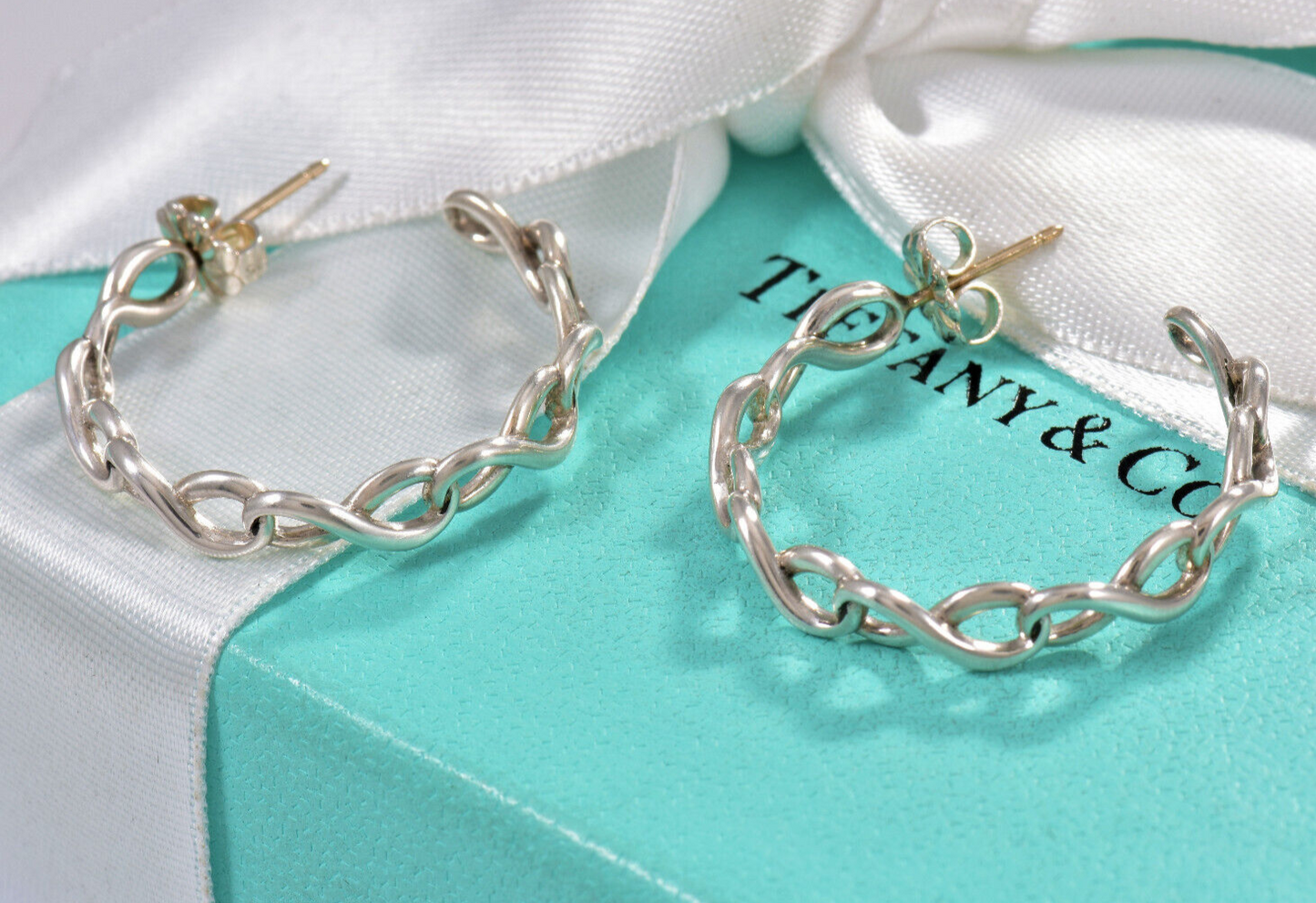 Tiffany & Co Sterling Silver 1" Infinity Hoop Earrings in Box Pouch Rare Eternal