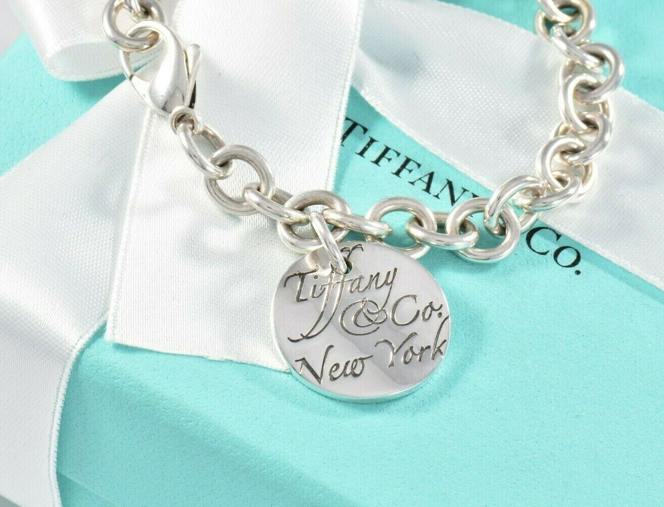 Tiffany & Co Silver NY Round Wavy Notes Tag Charm Chain Link Bracelet in Pouch