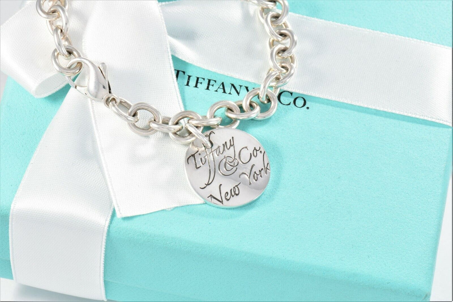 Tiffany & Co Silver NY Round Wavy Notes Tag Charm Chain Link Bracelet in Pouch