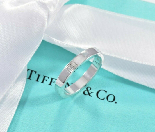 Tiffany & Co Silver 4mm Modern Atlas Roman Numerals Band Ring Size 6.5 in Pouch