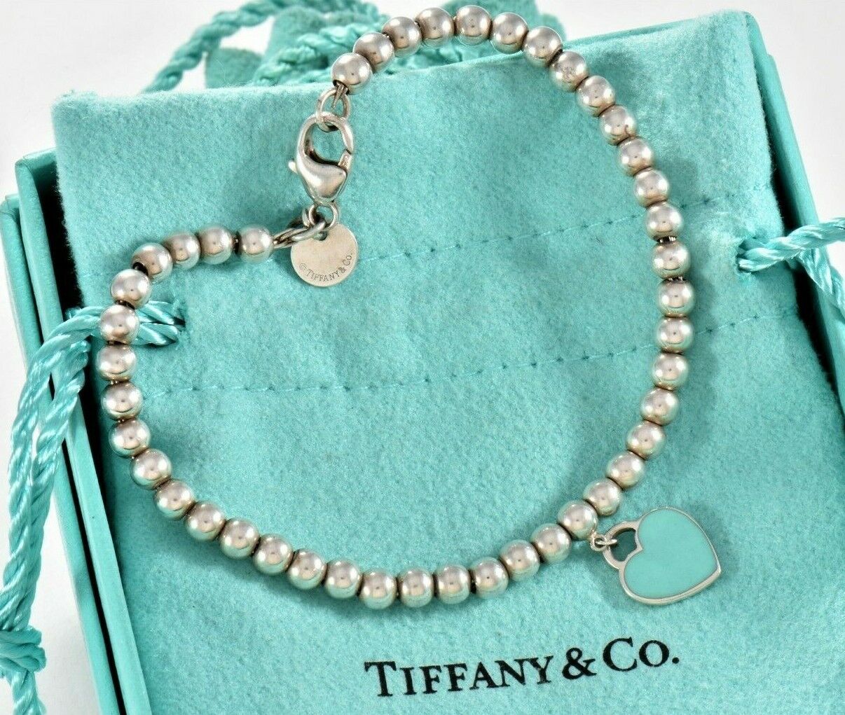 Please Return Tiffany & Co Silver Blue Enamel Heart Charm Bracelet 6.75" & Pouch