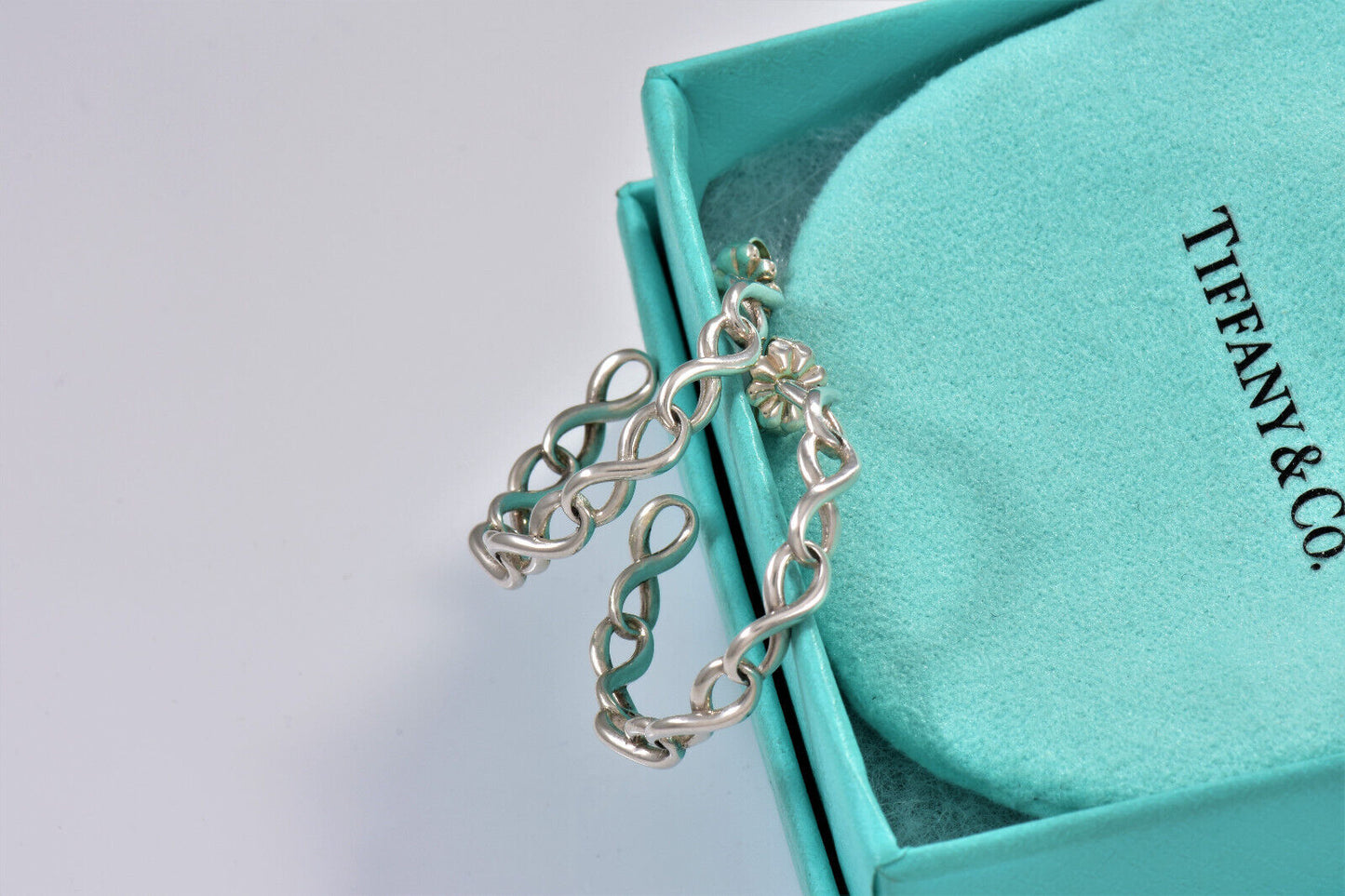 Tiffany & Co Sterling Silver 1" Infinity Hoop Earrings in Box Pouch Rare Eternal