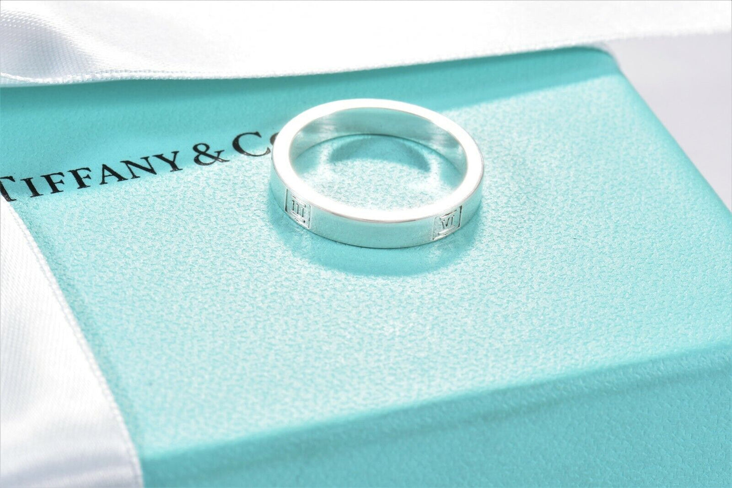 Tiffany & Co Silver 4mm Modern Atlas Roman Numerals Band Ring Size 6.5 in Pouch