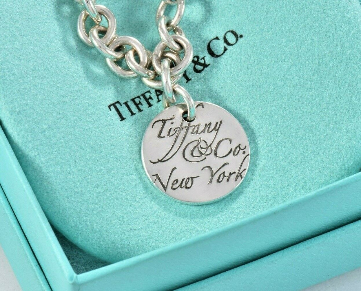 Tiffany & Co Silver NY Round Wavy Notes Tag Charm Chain Link Bracelet in Pouch