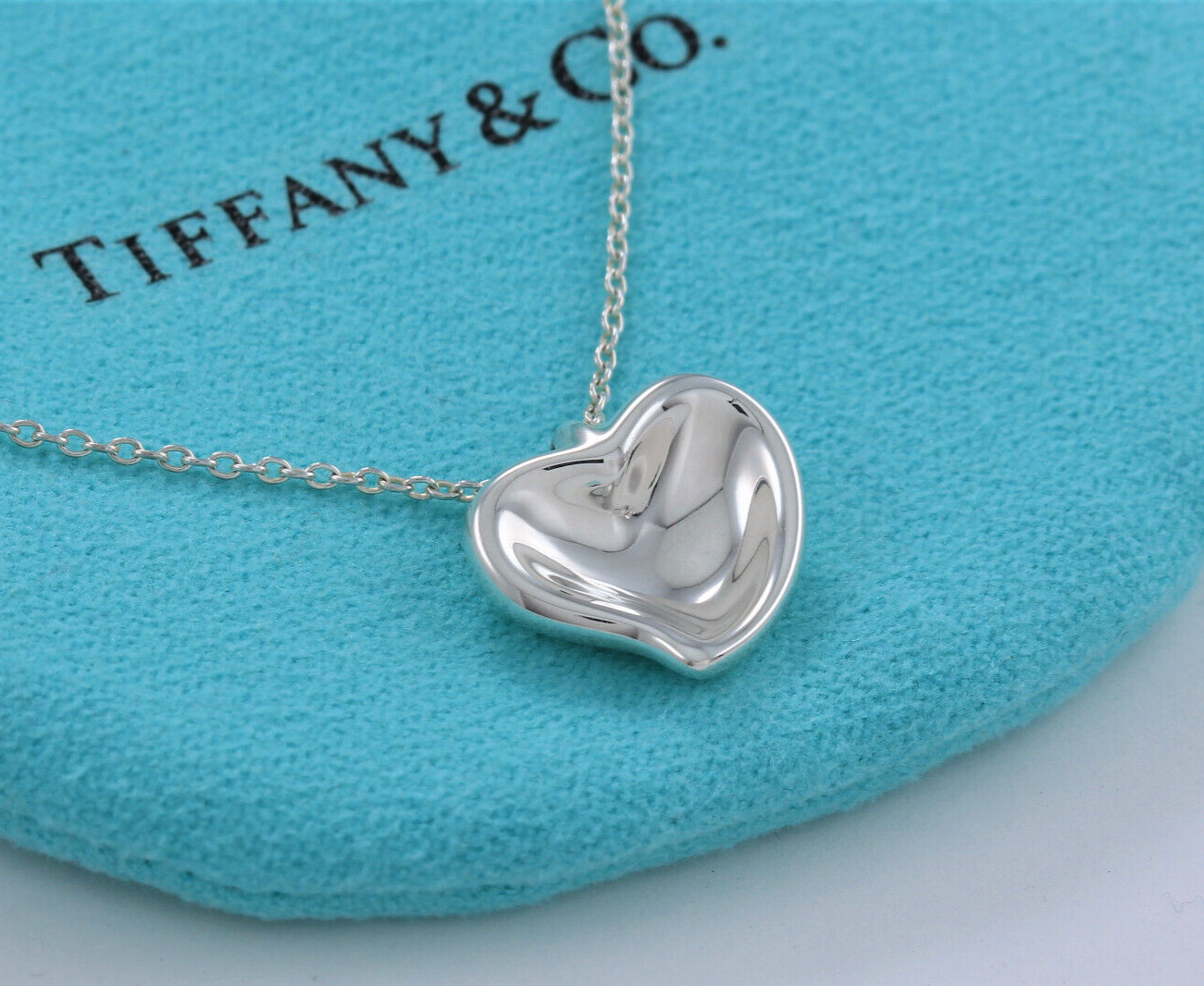 Tiffany & Co Sterling Silver Elsa Peretti Carved Heart Pendant Necklace in Pouch