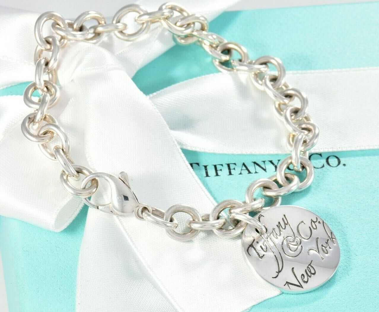 Tiffany & Co Silver NY Round Wavy Notes Tag Charm Chain Link Bracelet in Pouch