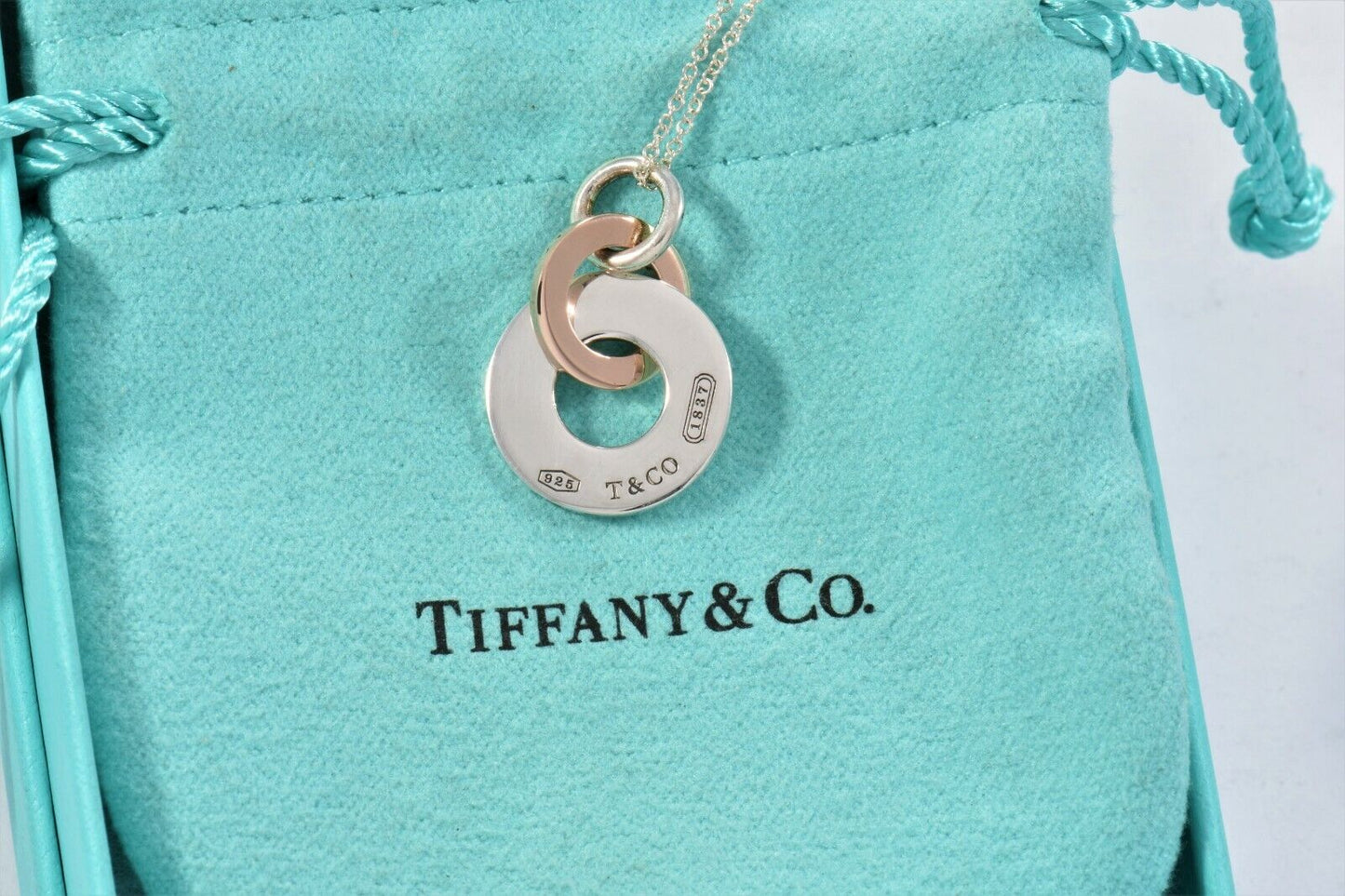 Tiffany & Co Silver Rubedo Gold Metal 1837 Interlocking Circles Pendant Necklace