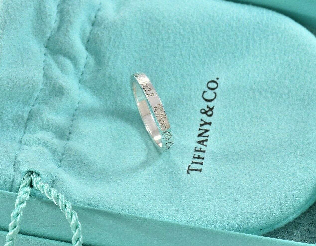 Tiffany & Co Silver Fifth Avenue Address Notes Narrow Band Ring Size 7 in Pouch