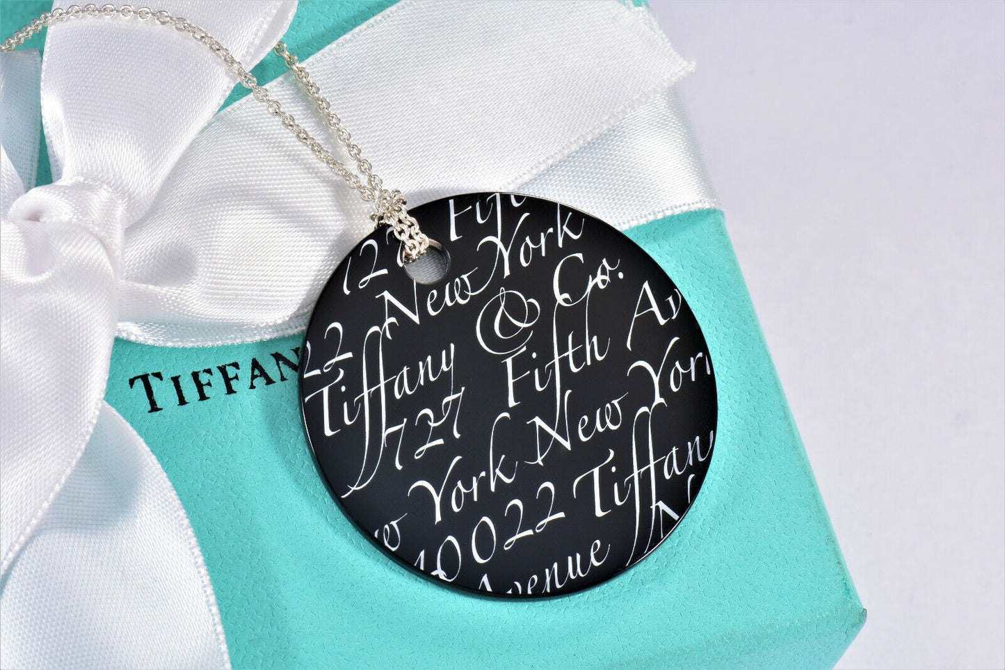 Tiffany & Co Silver Black Onyx NY Address Notes Round Circle Pendant Necklace