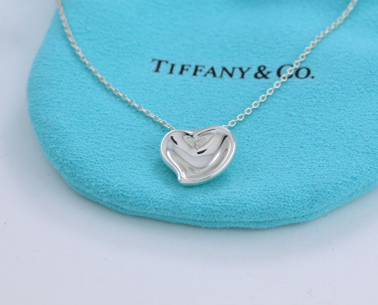 Tiffany & Co Sterling Silver Elsa Peretti Carved Heart Pendant Necklace in Pouch