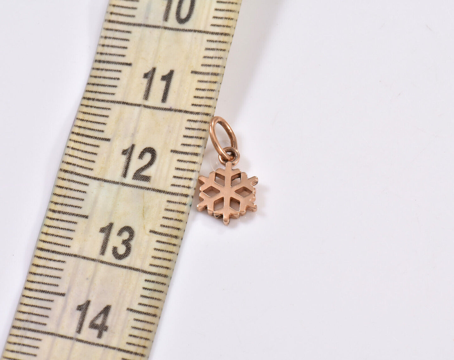 Tiffany & Co 18K Rose Gold Mini Snowflake Charm Pendant for Bracelet Necklace