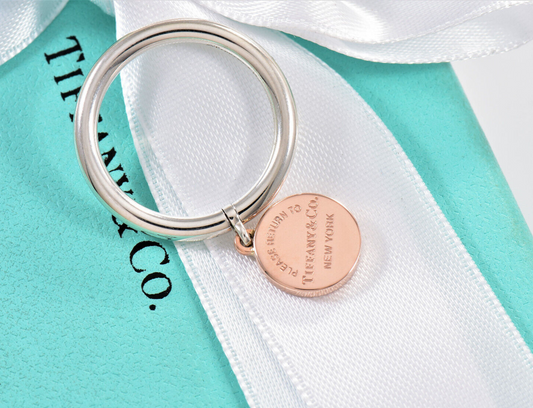 Please Return Tiffany & Co Silver Rubedo Gold Metal Round Tag Swivel Ring Size 8