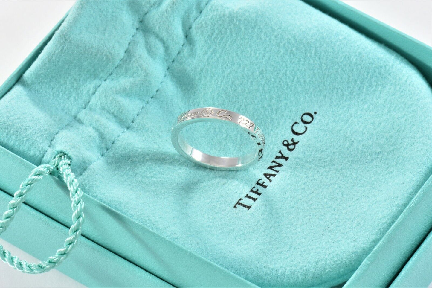 Tiffany & Co Silver Fifth Avenue Address Notes Narrow Band Ring Size 7 in Pouch