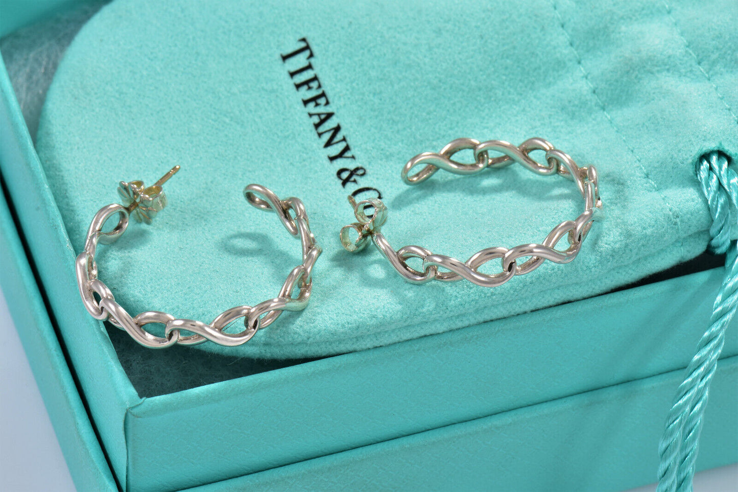 Tiffany & Co Sterling Silver 1" Infinity Hoop Earrings in Box Pouch Rare Eternal