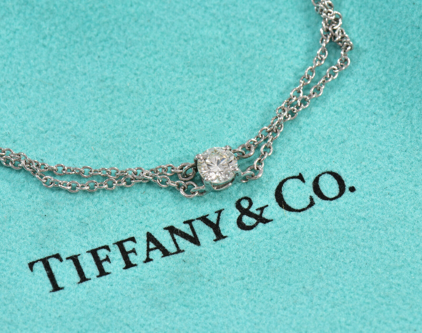 Tiffany & Co .17 ct Diamond Solitaire Platinum Double Chain Bracelet & Box Pouch