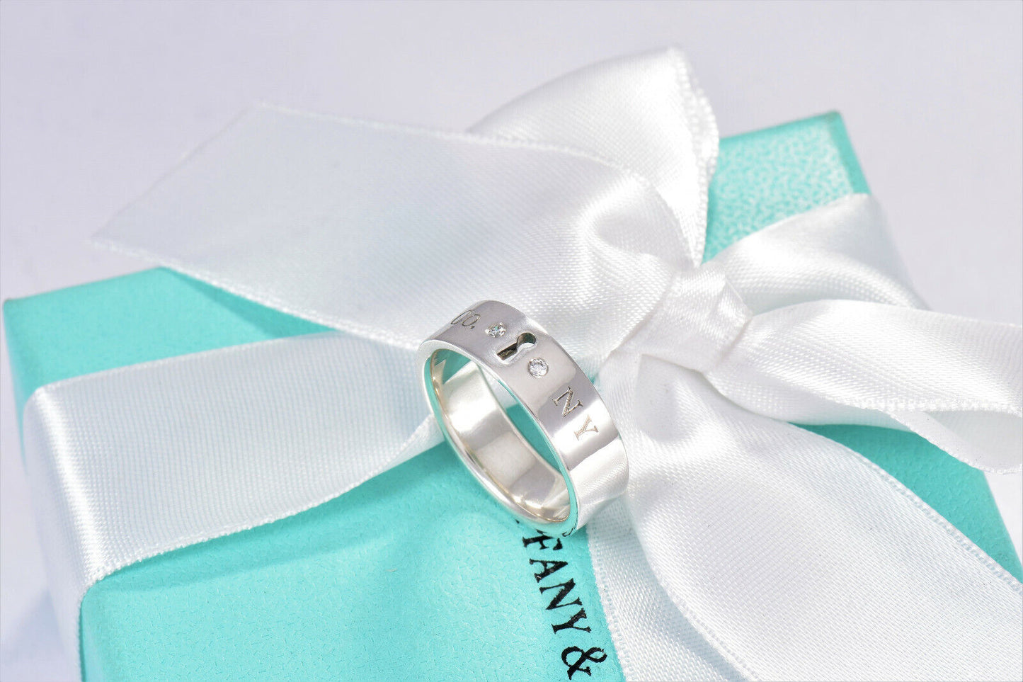 Tiffany & Co Sterling Silver Two Diamond Keyhole Lock Ring Size 4.5 Pouch Lovely