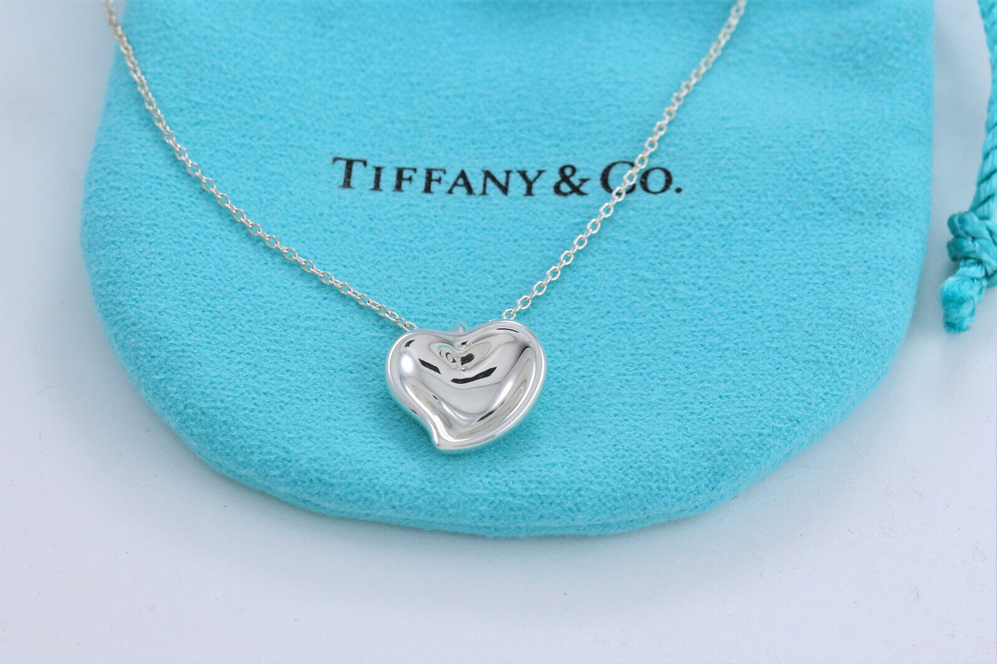 Tiffany & Co Sterling Silver Elsa Peretti Carved Heart Pendant Necklace in Pouch