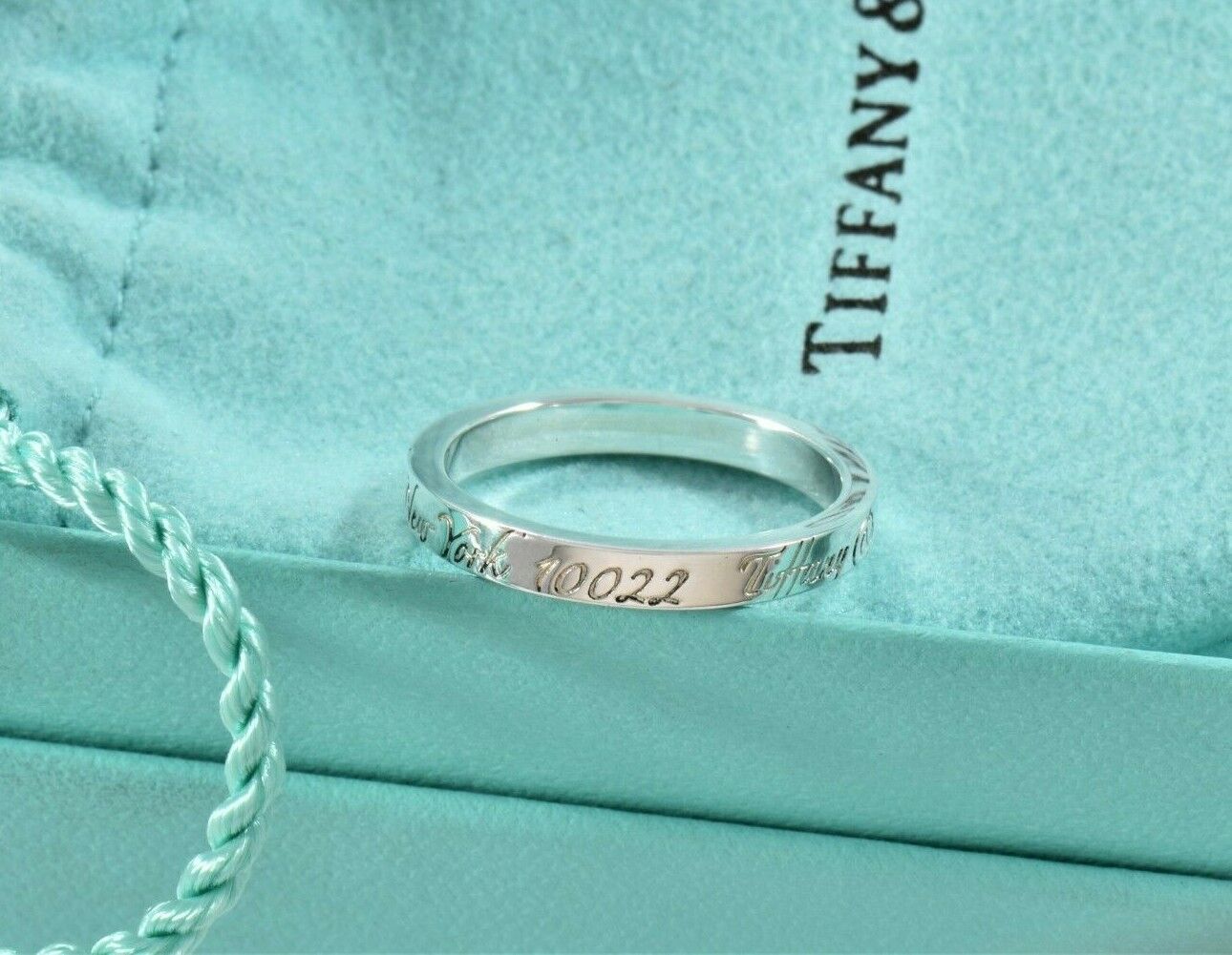 Tiffany & Co Silver Fifth Avenue Address Notes Narrow Band Ring Size 7 in Pouch