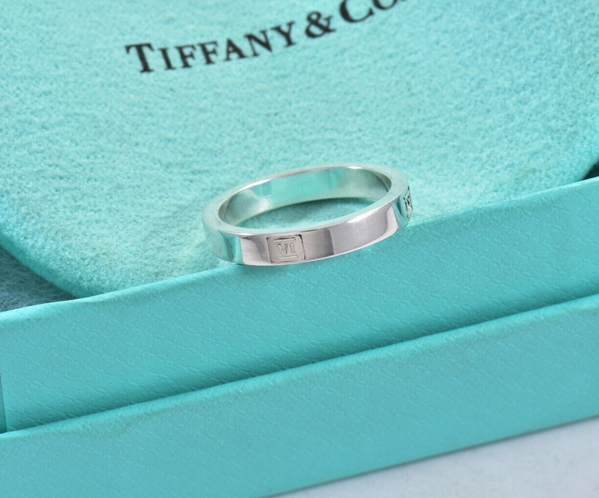 Tiffany & Co Silver 4mm Modern Atlas Roman Numerals Band Ring Size 6.5 in Pouch