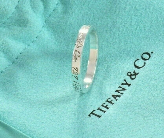 Tiffany & Co Silver Fifth Avenue Address Notes Narrow Band Ring Size 7 in Pouch