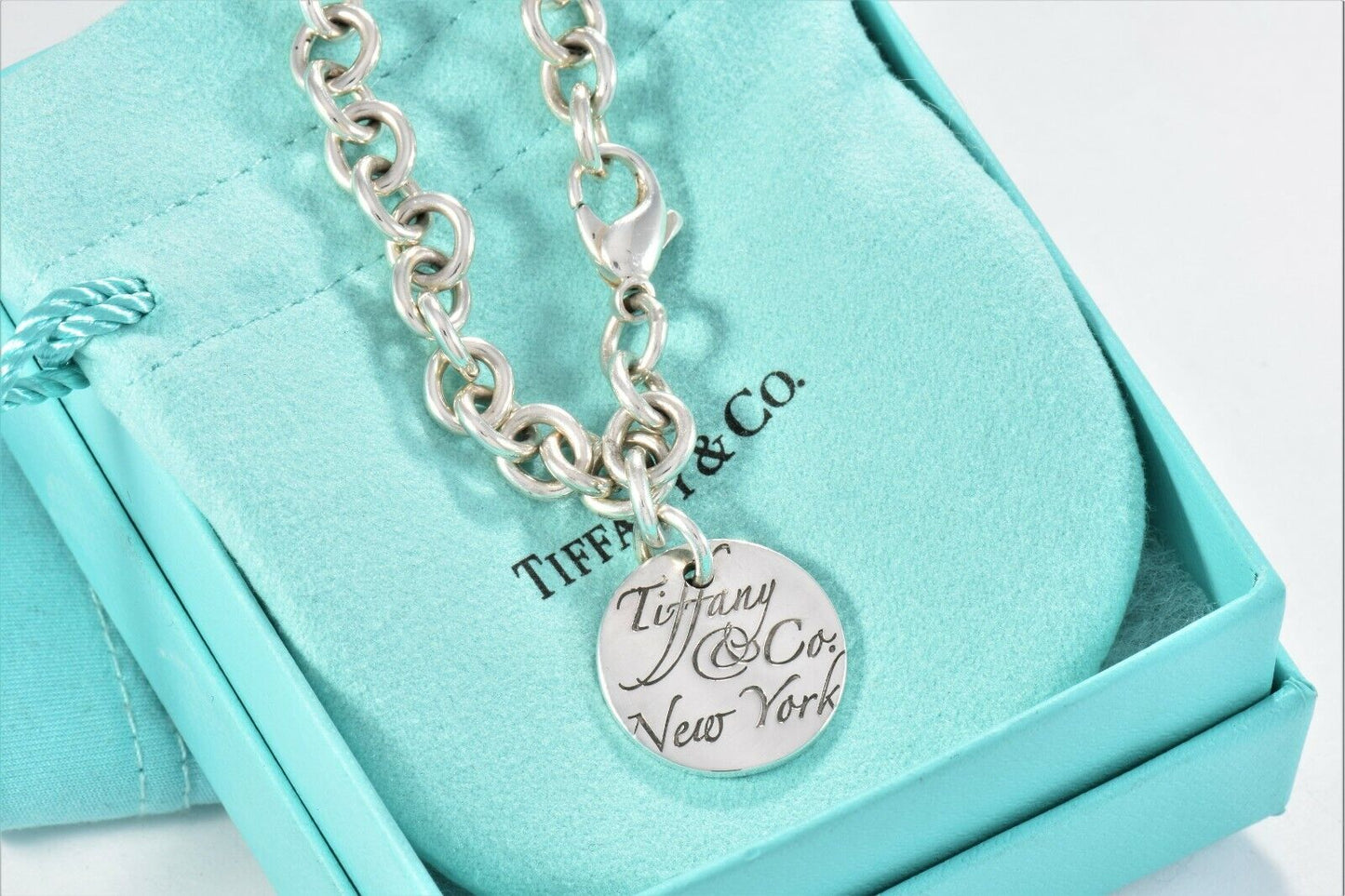 Tiffany & Co Silver NY Round Wavy Notes Tag Charm Chain Link Bracelet in Pouch