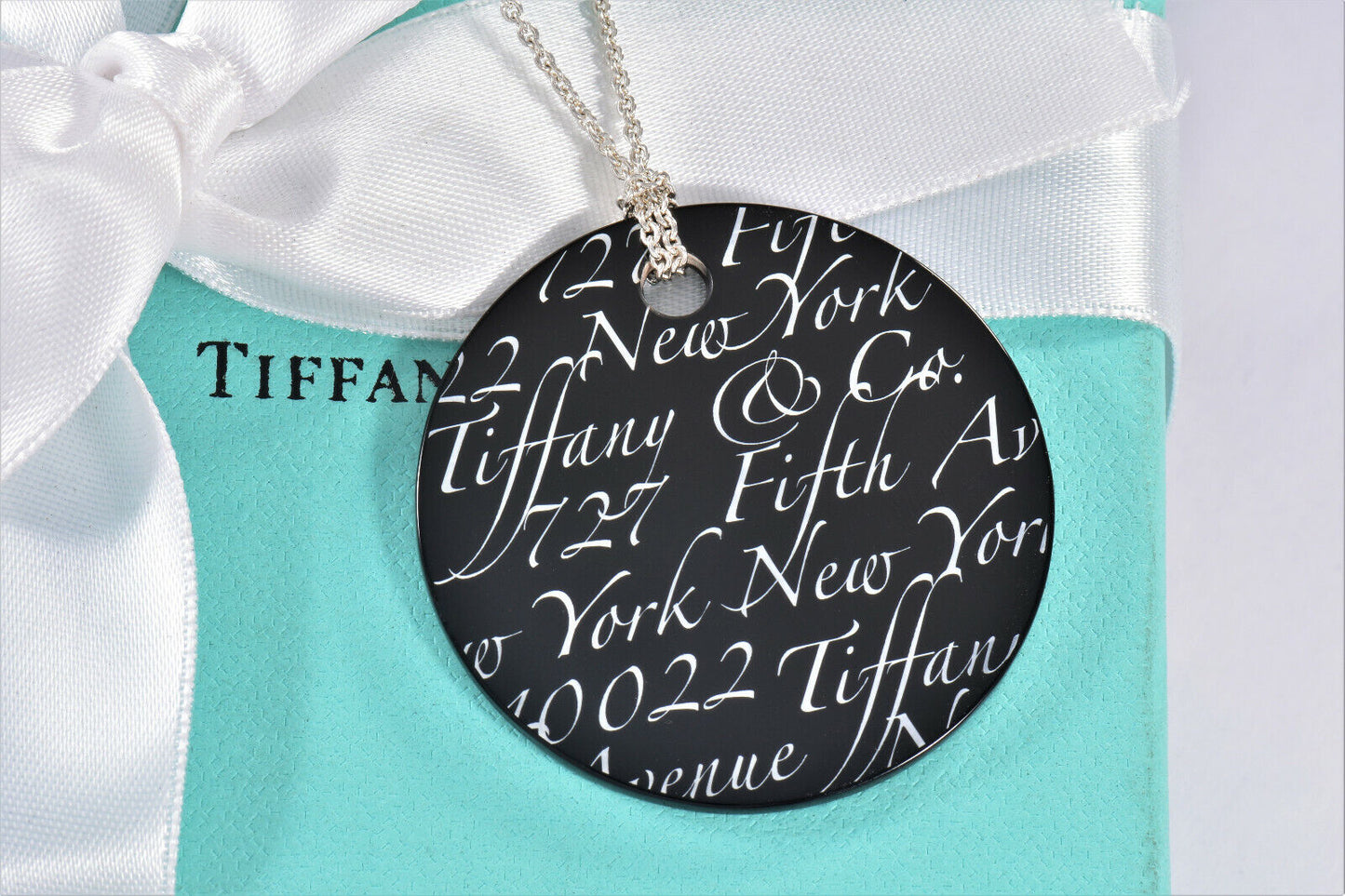 Tiffany & Co Silver Black Onyx NY Address Notes Round Circle Pendant Necklace