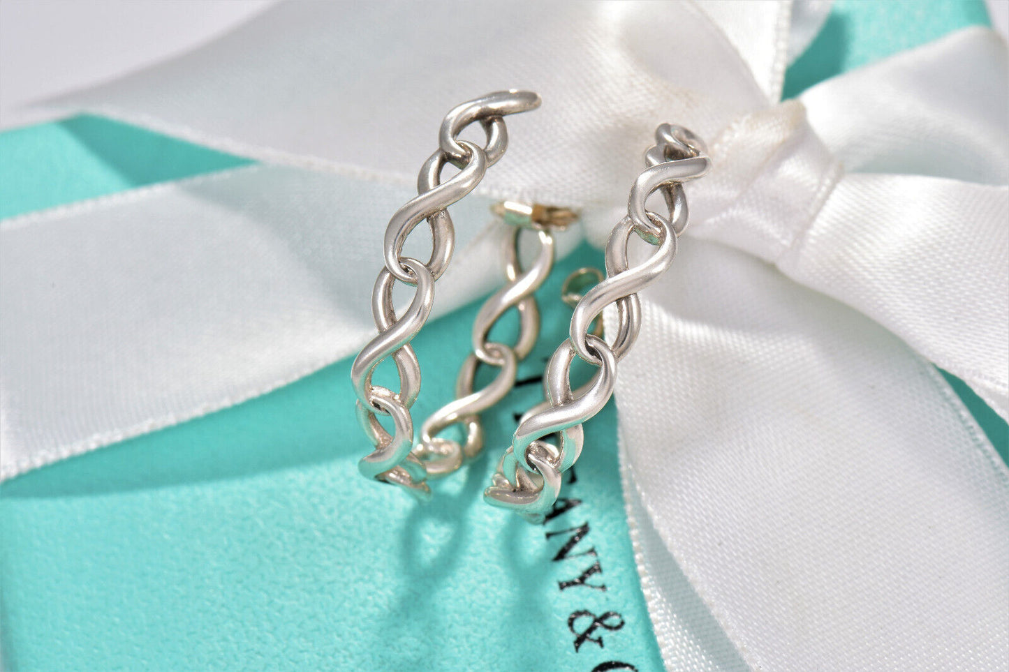 Tiffany & Co Sterling Silver 1" Infinity Hoop Earrings in Box Pouch Rare Eternal